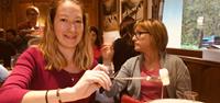 UTracks' Allie eating fondue on Mont Blanc walk