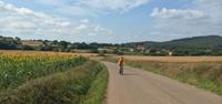 Child cycling the Catalonia countryside - UTracks Travel