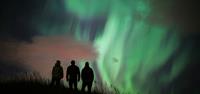 Group mesmerised by the Aurora in Iceland