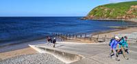 Walkers setting off from St Bees