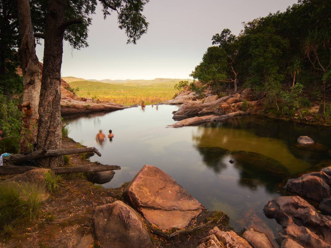 Relaxing in the waterhole above Gunlom Waterfall on the Kakadu Walking Adventure |  <i>Rhys Clarke</i>