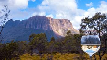 Cradle Mountain Huts,Great Walks of Australia Enjoy a glass of wine after a day's trek along the Overland Track