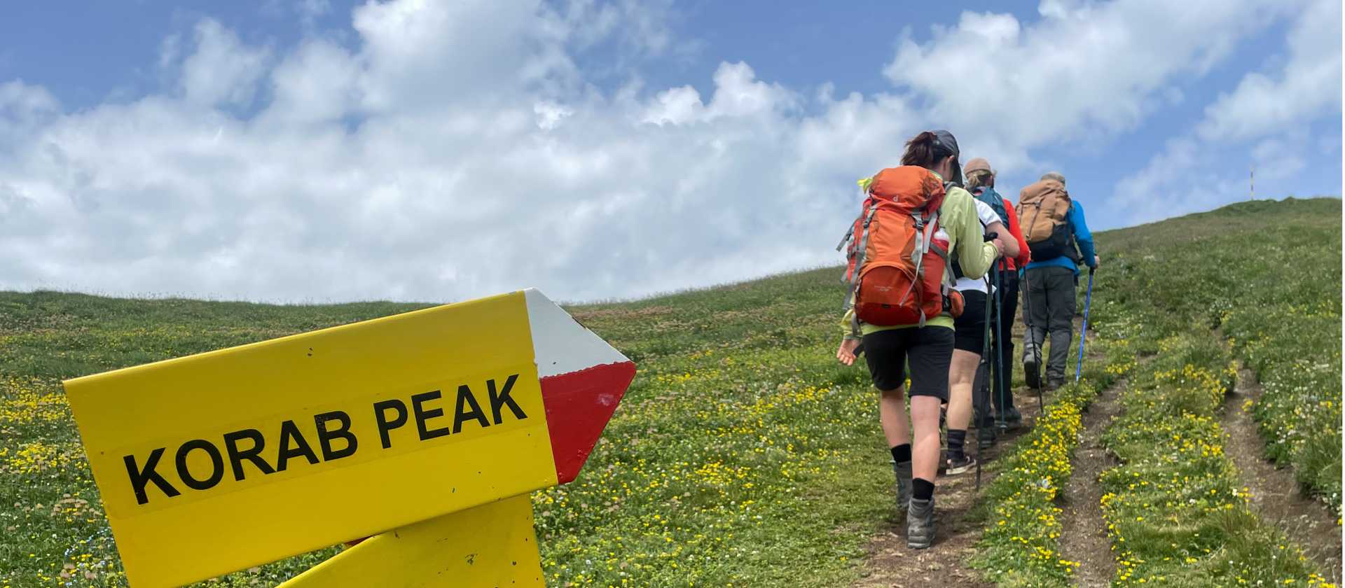 Hikers making their way to Korab Peak which at 2,764 meters is the highest mountain in both Albania and North Macedonia