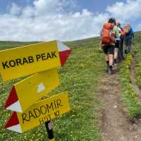 Hikers making their way to Korab Peak which at 2,764 meters is the highest mountain in both Albania and North Macedonia
