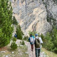 Hikers descending from the Pejë Pass to the Theth Valley | Kate Baker