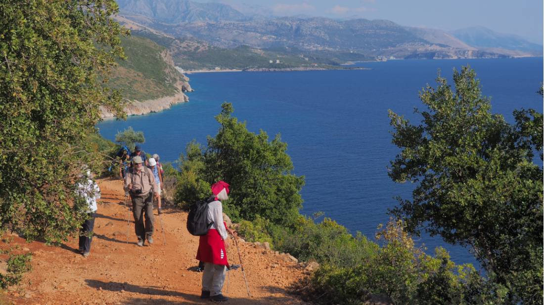 Hikers taking in the view on a southern Albanian coastal trail