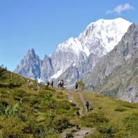 Group trekking along the Val Ferret balcony path | Ryan Graham