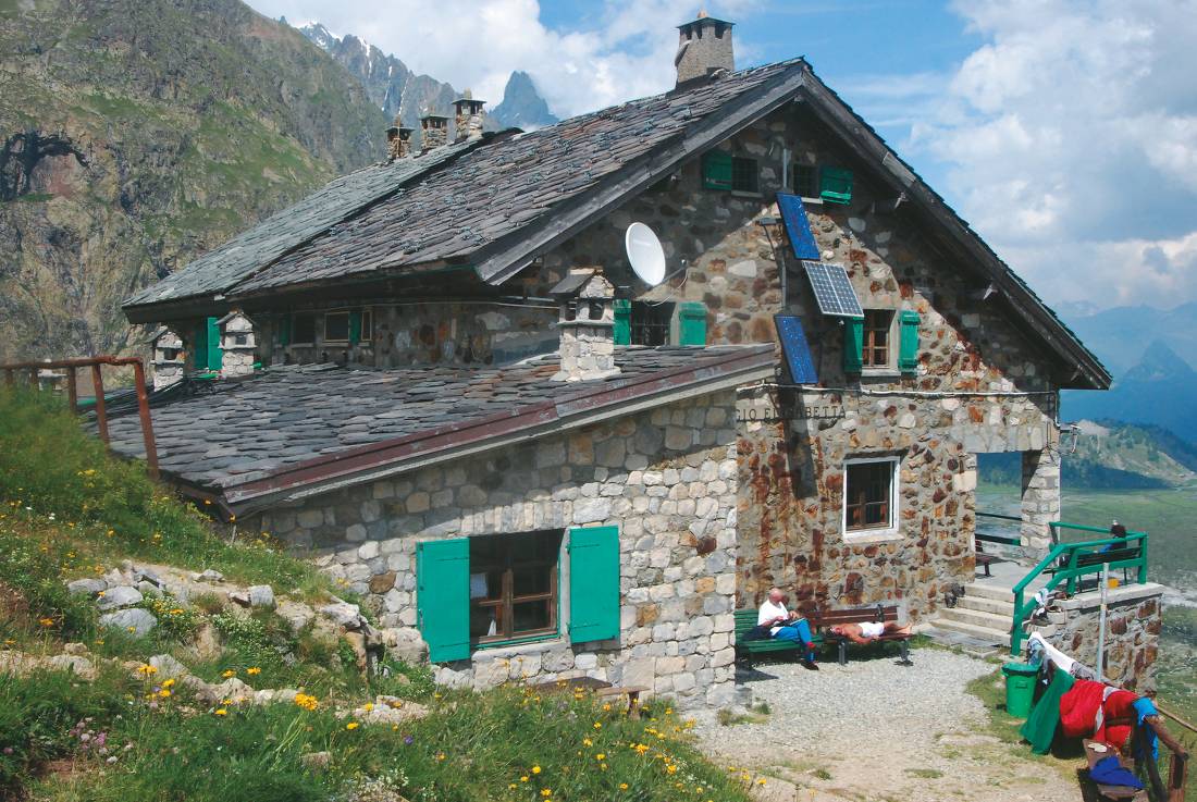 Elizabetta Soldini Refuge situated just below the col where the most famous climbing routes on Mont Blanc can be seen including the Peuterey Ridge and Brouillard Face. |  <i>Sue Badyari</i>