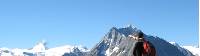 Hiker admiring the view on the Haute Route |  <i>Sarah Higgins</i>