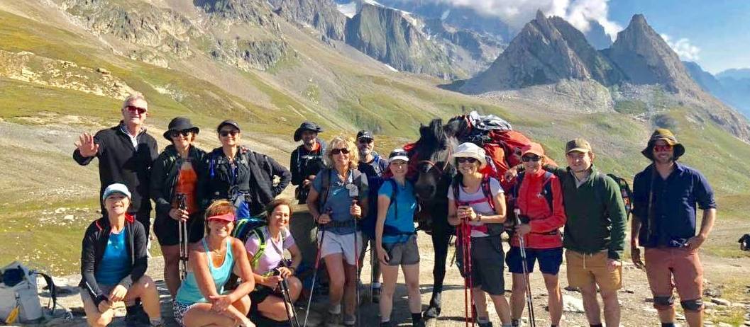Group posing at the Italian-French border in the Alps |  <i>Ryan Graham</i>