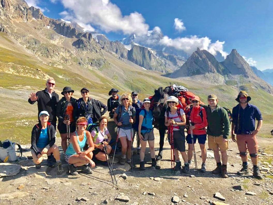 Group posing at the Italian-French border in the Alps |  <i>Ryan Graham</i>