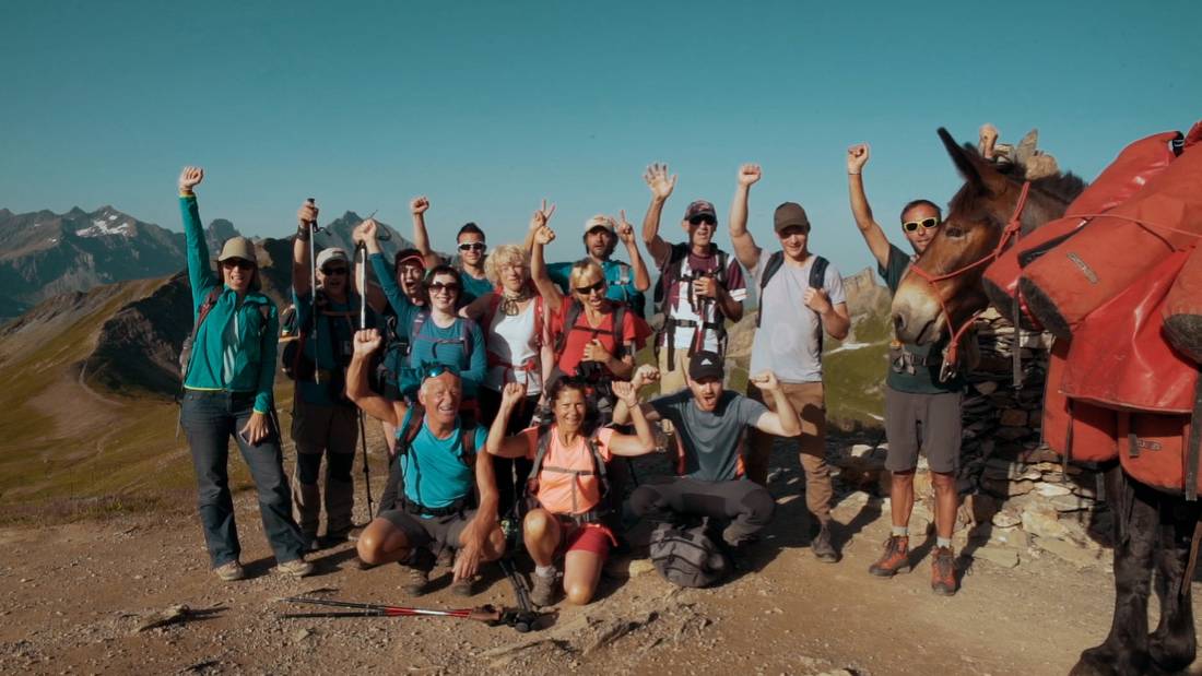 Happy group having reached one of the high passes on the Tour du Mont Blanc |  <i>Tim Charody</i>