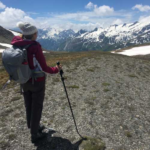 A hiker stopping to appreciate where they've just come from