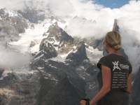 UTracks staff member on balcony trail overlooking Mont Blanc and glaciers Italy |  <i>Kate Baker</i>