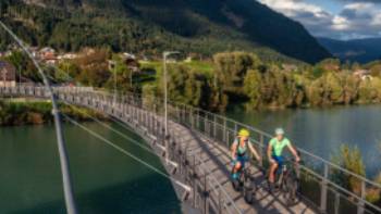 Cycling over the Drau river in Austria