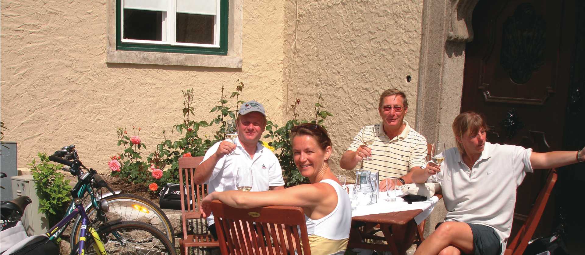 Cyclists enjoying wine tasting in the Wachau Valley, Austria | Kate Baker