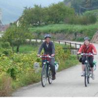 A family riding together through the Wachau region | Richard Tulloch