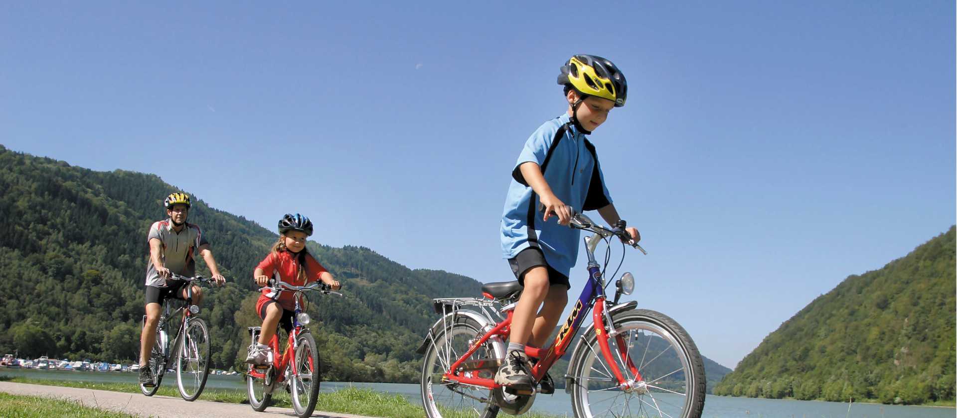 Kids cycling along the Danube