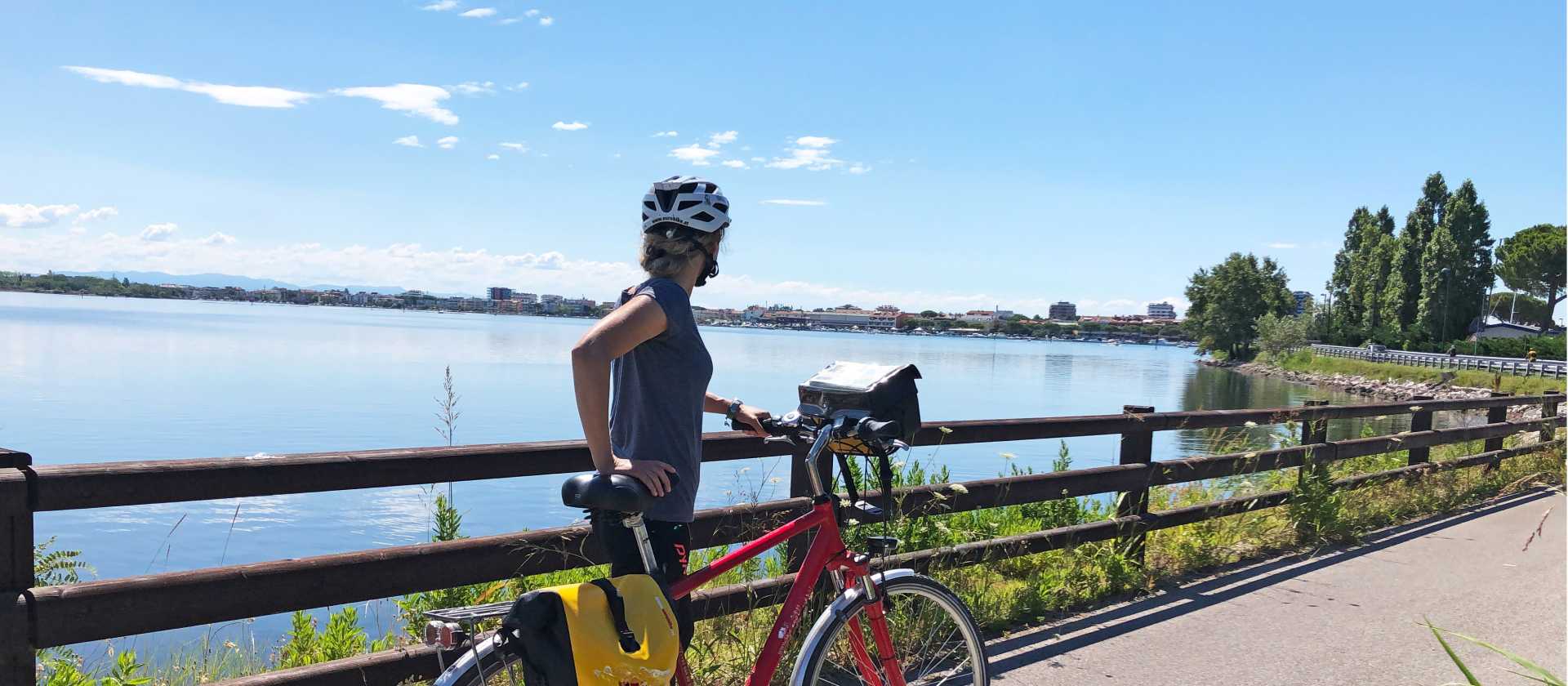 Taking in a view of the sea on the Alpe Adria Cycle Path