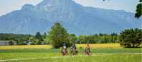 Cyclists on the Alpe Adria with the Untersberg as a backdrop