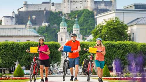 Cyclists leaving Salzburg from the Mirabell Gardens