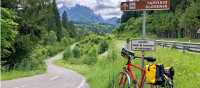 Cyclist on the Alpe Adria route outside Tarvisio Italy