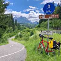 Cyclist on the Alpe Adria route outside Tarvisio Italy