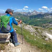 Hiker overlooking Oberstdorf from the Nebelhorn in the Allgäu Alps