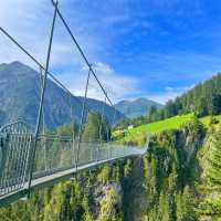 Holzgau's spectacular suspension bridge spans a dramatic gorge in the Lechtal Valley