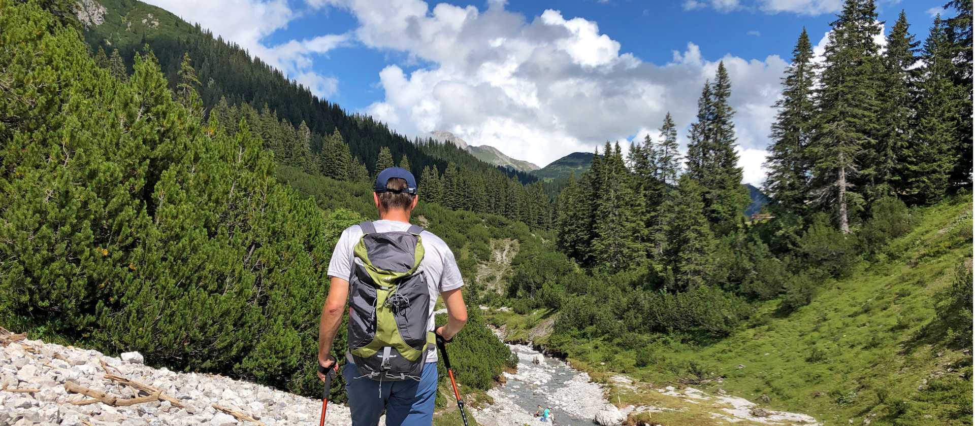 Hiker traversing the spectacular alpine trails of Austria's Lechtal Valley