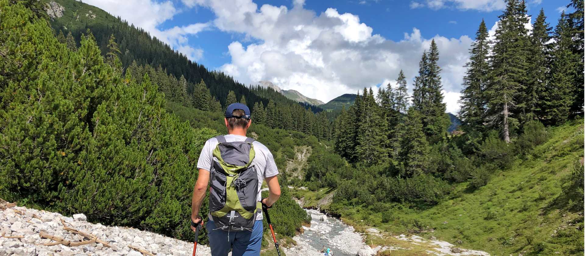 Hiker traversing the spectacular alpine trails of Austria's Lechtal Valley