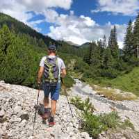 Hiker traversing the spectacular alpine trails of Austria's Lechtal Valley