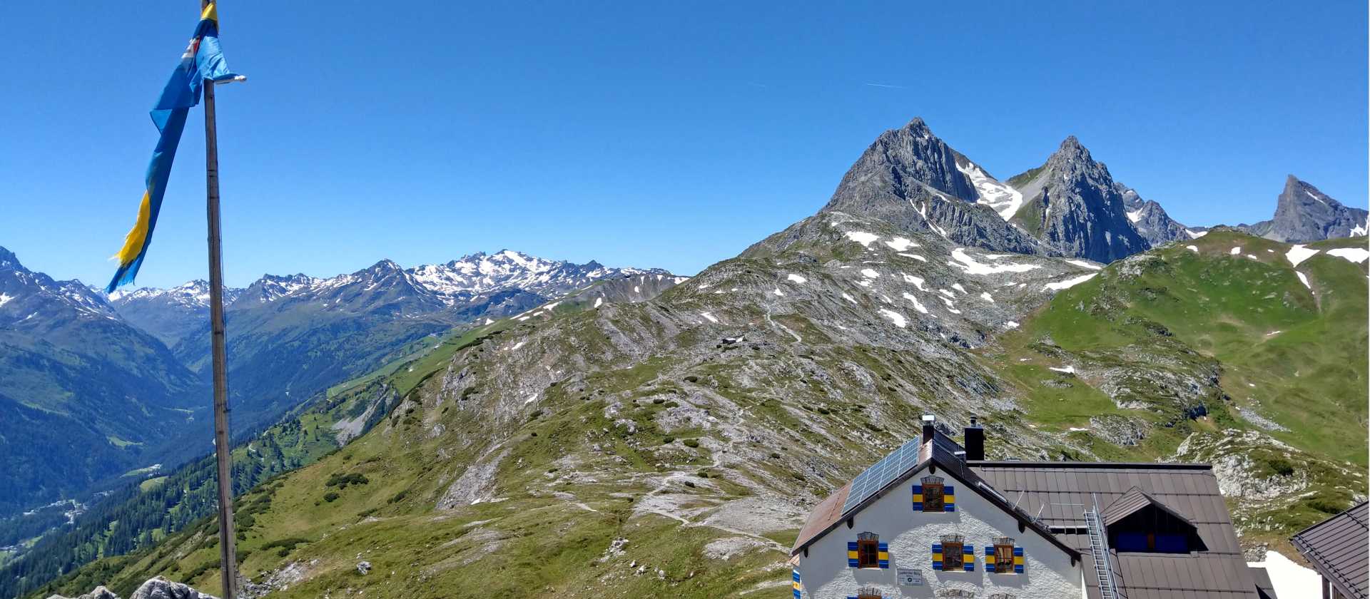 Leutkircher Hut perched high above the rugged peaks of the Lechtal Alps