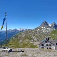 Leutkircher Hut perched high above the rugged peaks of the Lechtal Alps