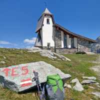 Rettenbach Glacier Memorial Chapel amid the dramatic peaks of the Ötztal Alps