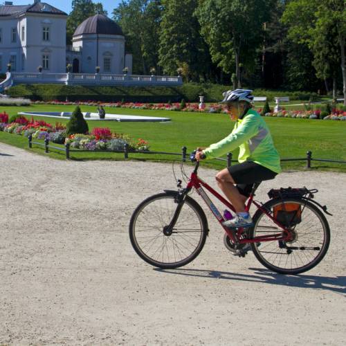 Cycling past the palace in Palanga, Lithuania
