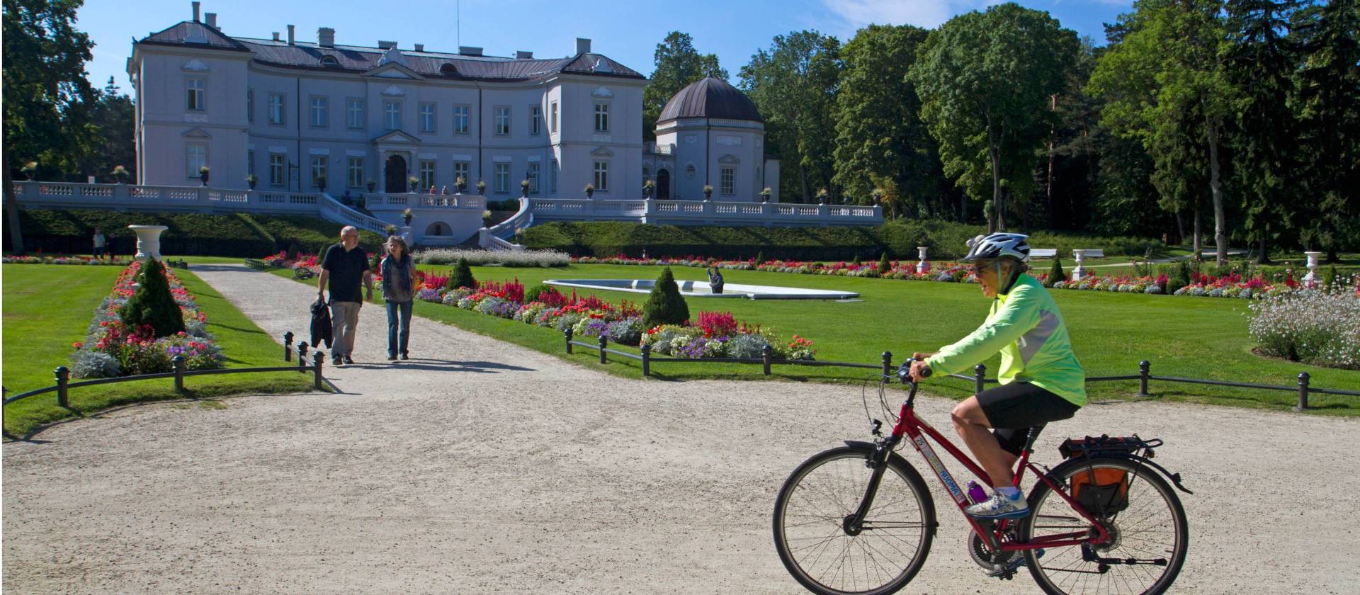 Cycling past the palace in Palanga, Lithuania | Andrew Bain
