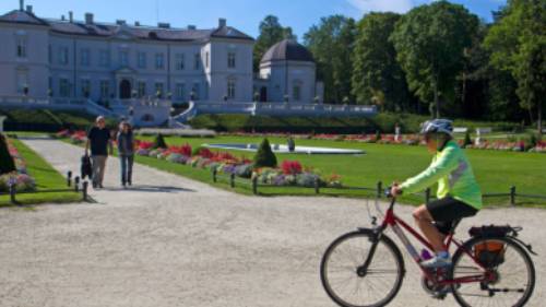 Cycling past the palace in Palanga, Lithuania | Andrew Bain