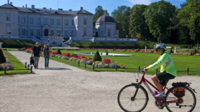 Cycling past the palace in Palanga, Lithuania | Andrew Bain