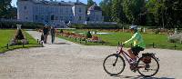 Cycling past the palace in Palanga, Lithuania | Andrew Bain