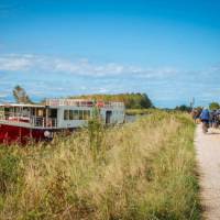 Explore Venice on the Ave Maria barge and bike tour