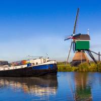 Sarah sailing in Holland with Windmill