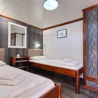Relax in comfortable cabins after a day of cycling.