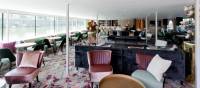 Spacious salon with panoramic windows aboard the MS Arkona