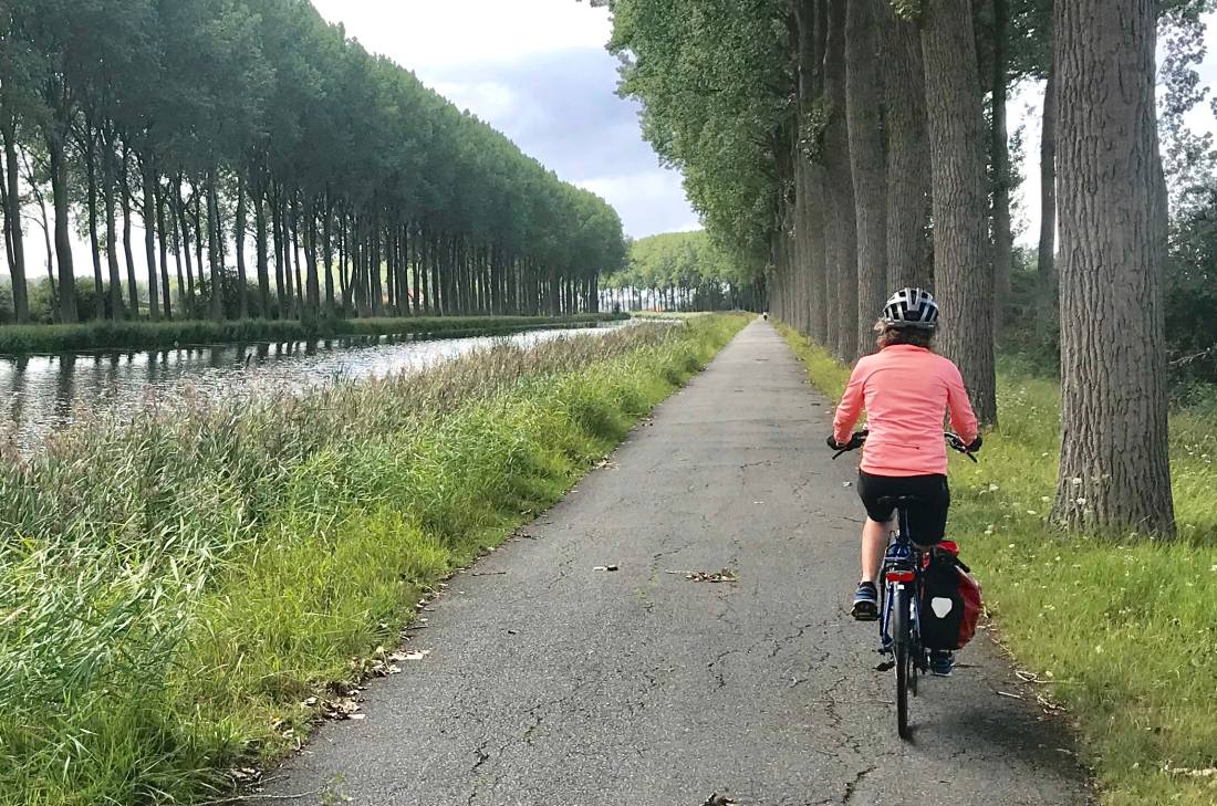 Cycling by a canal into Ghent, Belgium |  <i>Pat Black</i>