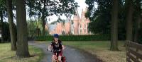 Young cyclist outside a castle near Ghent | Hilary Delbridge