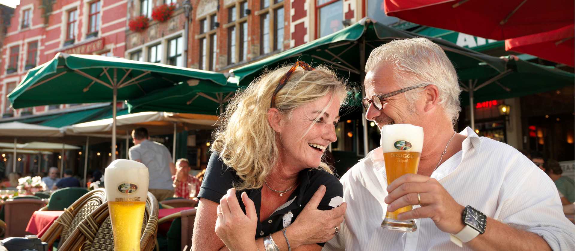 A happy couple enjoying their holiday in Belgium.