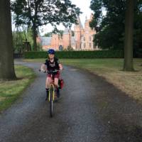 Young cyclist outside a castle near Ghent | Hilary Delbridge