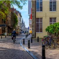 Cycle through the pretty town of Ghent in Belgium