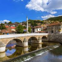 Experience the tranquil waterways of Sarajevo, Bosnia, while on the Via Dinarica